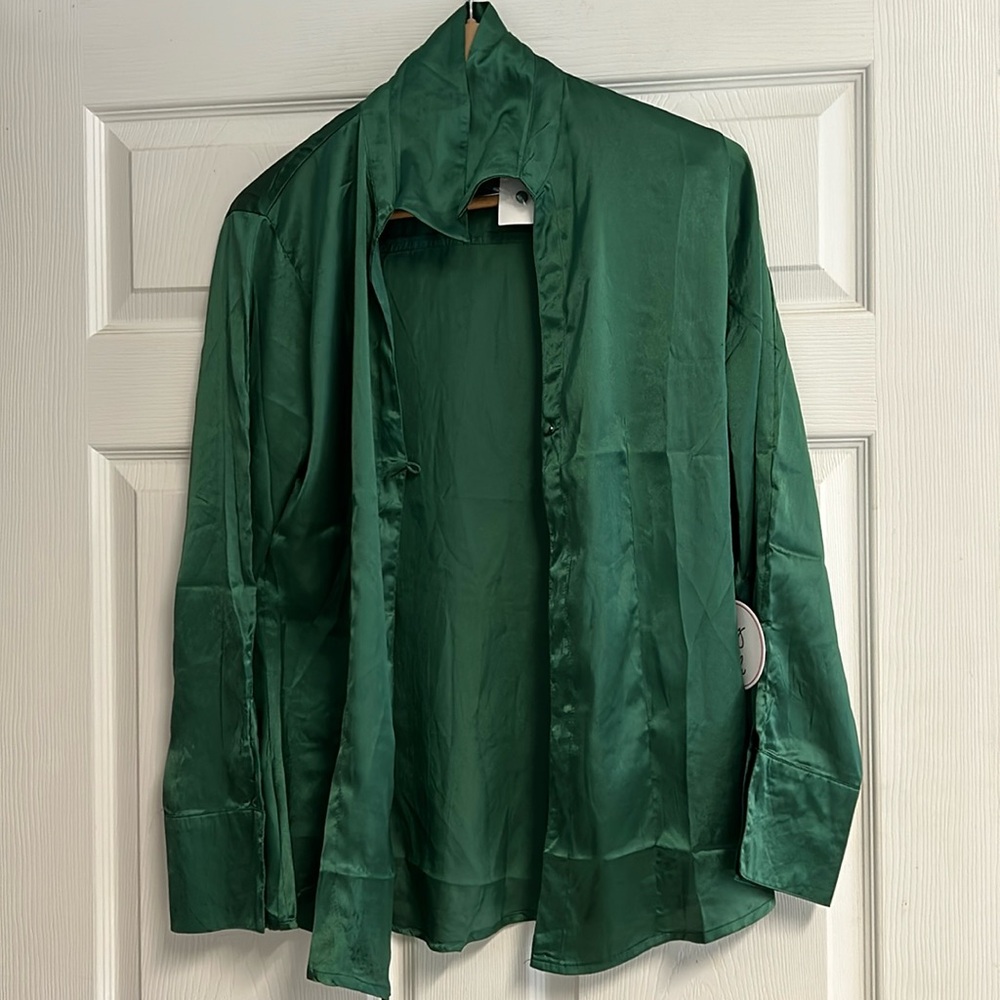 New with tags green satin top with one eye hook closure